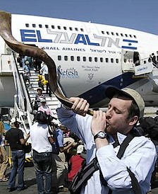 Blowing the shofar upon...