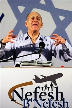 Israeli Prime Minister Ehud Olmert gestures as he speaks during ...